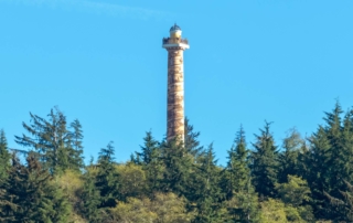 Astoria Oregon has many attractions and museum like the Astoria Column, which is featured in this picture.