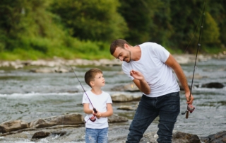 Father and son fishing on Rivers Of Oregon.