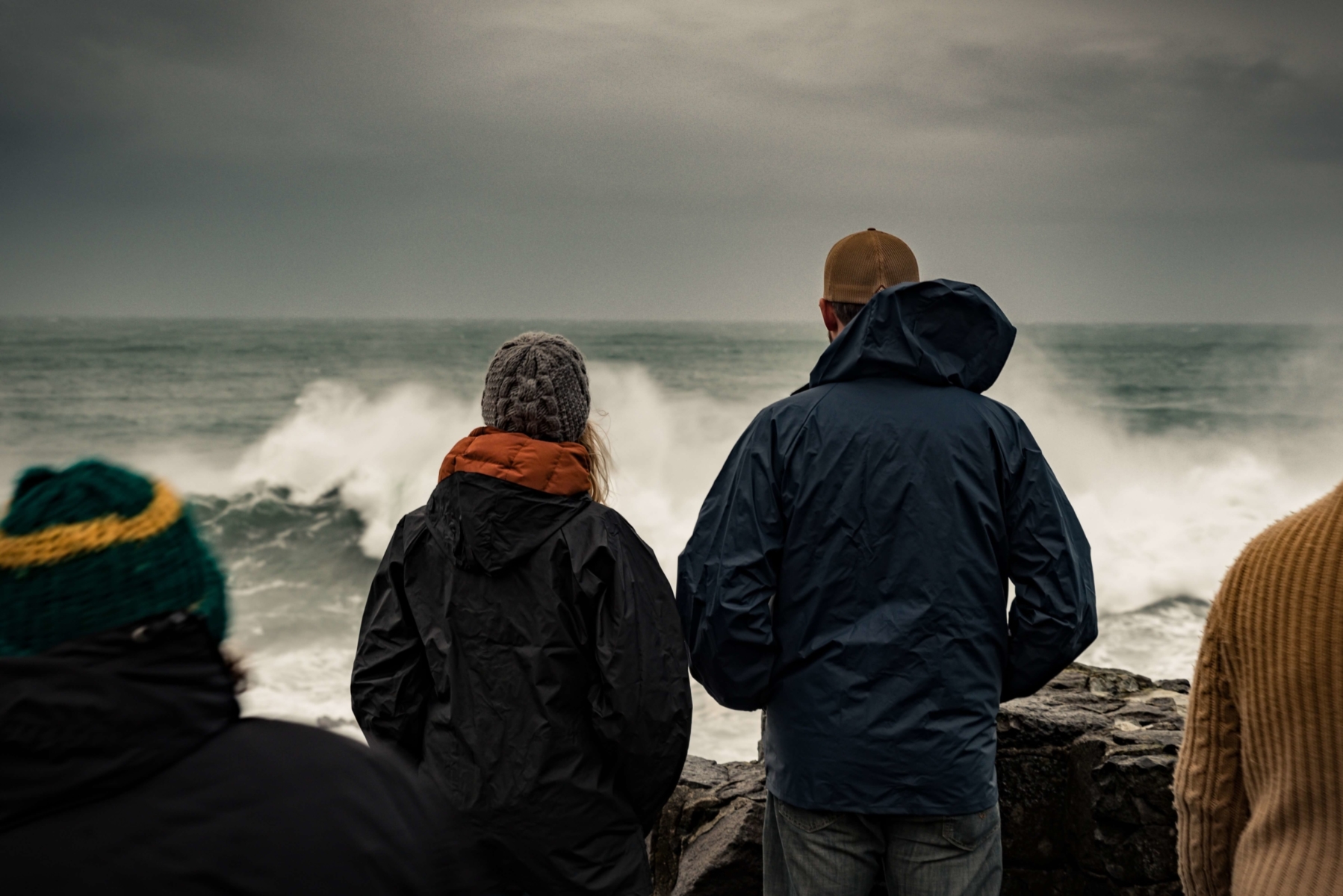 Two people watching an Oregon Storm.