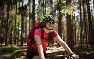 A woman on a Mountain Bike in Oregon​.